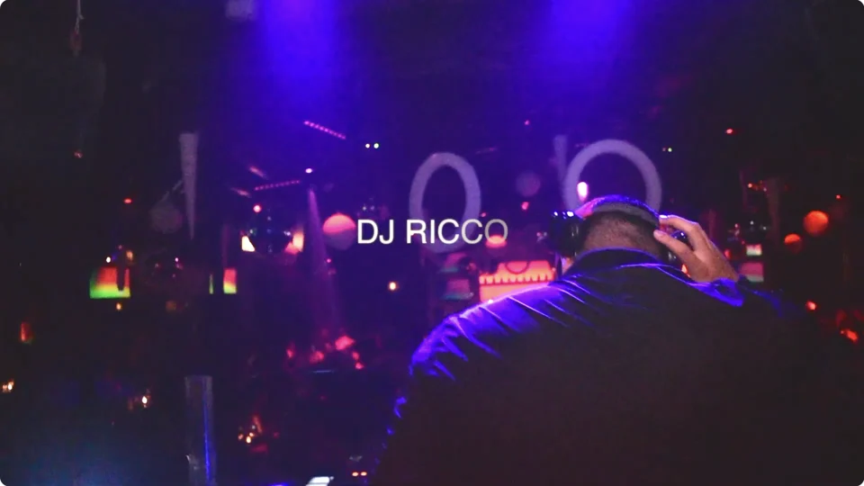 DJ Ricco performing, decade recap video